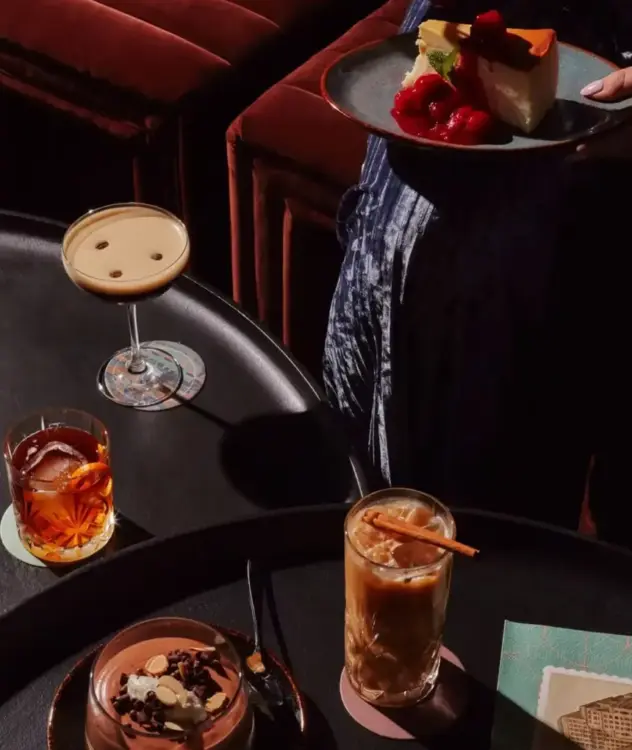 A selection of drinks and desserts on a table